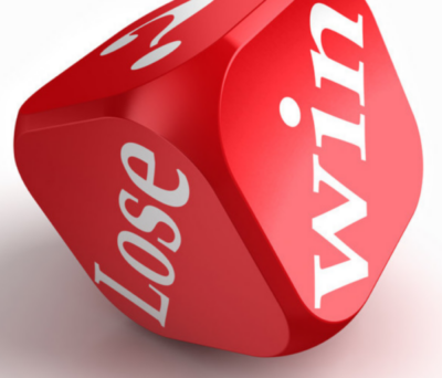 Red die showing "Win" and "Lose" faces.